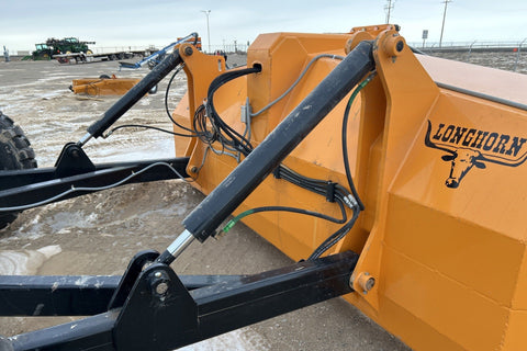Industries America 16 FT Hydraulic Pull Scraper – Side View on Tractor

Heavy-Duty Orange Scraper with Flotation Tires – Field Ready

16 Foot U-Blade Hydraulic Scraper for Earthmoving Projects

Tractor Attachment Scraper with Tilt Function – Rear Angle View