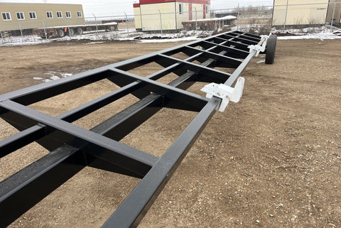 Industries America 441 Header Trailer – Side View with Bunks

41 FT Header Transport Trailer – Tandem Axle Design

Black Agricultural Header Trailer – Top Angle

Header Hauling Trailer with Adjustable Support Arms

Industrial 41 FT Trailer for Agricultural Equipment Transport