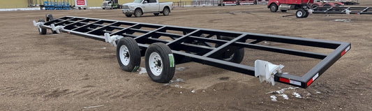 Industries America 441 Header Trailer – Side View with Bunks

41 FT Header Transport Trailer – Tandem Axle Design

Black Agricultural Header Trailer – Top Angle

Header Hauling Trailer with Adjustable Support Arms

Industrial 41 FT Trailer for Agricultural Equipment Transport