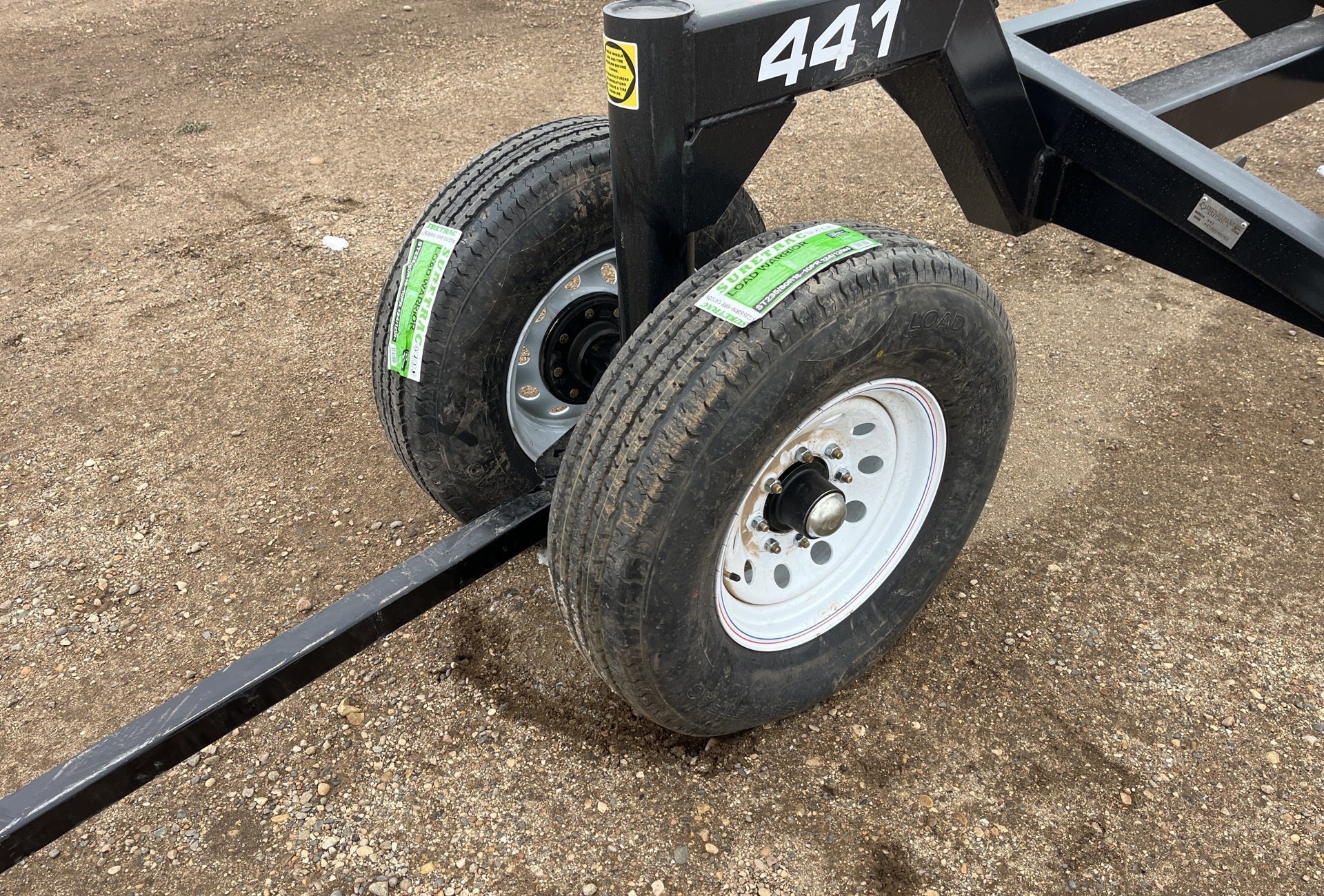 Industries America 441 Header Trailer – Side View with Bunks

41 FT Header Transport Trailer – Tandem Axle Design

Black Agricultural Header Trailer – Top Angle

Header Hauling Trailer with Adjustable Support Arms

Industrial 41 FT Trailer for Agricultural Equipment Transport
