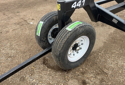 Industries America 441 Header Trailer – Side View with Bunks

41 FT Header Transport Trailer – Tandem Axle Design

Black Agricultural Header Trailer – Top Angle

Header Hauling Trailer with Adjustable Support Arms

Industrial 41 FT Trailer for Agricultural Equipment Transport