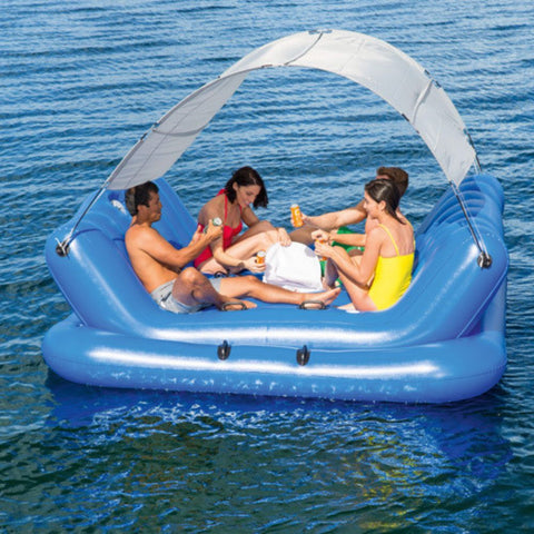 4-seat inflatable island float with sunshade
floating pool lounge with built-in cup holders
relaxing inflatable float for adults
inflatable pool island with cooler and speaker
heavy-duty lake float for 4 people