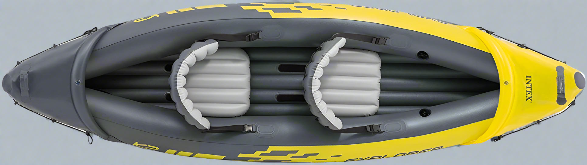 Intex Explorer K2 inflatable kayak on water with paddles

Top view of Explorer K2 kayak with seats and pump

Close-up of inflatable cockpit seats

Full kayak set with oars, pump, and skeg

Explorer K2 in yellow – packaged with accessories