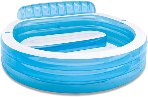 Intex Swim Center Family Lounge Pool with kids

Top view of inflatable lounge pool with bench

Inflatable family pool with built-in seat and backrest

Parents and kids relaxing in backyard pool

Blue vinyl family-size lounge pool filled with water