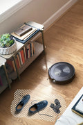 “iRobot Roomba J8+ robot vacuum with self-emptying dock and bonus bags”

“Smart mapping and precision cleaning robot vacuum for pets”

“Roomba J8 Plus with automatic dirt disposal and extra bags”

“Top view of Roomba J8+ cleaning hardwood floors”

“Roomba J8+ smart obstacle-avoiding robot vacuum system”