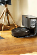 “iRobot Roomba J8+ robot vacuum with self-emptying dock and bonus bags”

“Smart mapping and precision cleaning robot vacuum for pets”

“Roomba J8 Plus with automatic dirt disposal and extra bags”

“Top view of Roomba J8+ cleaning hardwood floors”

“Roomba J8+ smart obstacle-avoiding robot vacuum system”