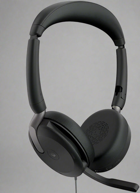 Jabra Evolve2 65 Flex headset full view with mic boom
Folded Jabra headset showing portability
Side view of Jabra Evolve2 with ANC earcups
Headset in use with Teams-certified functionality