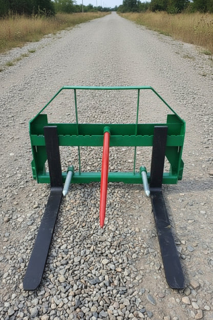 John Deere Euro Global 2-in-1 hay spear and pallet fork combo in use

Front view of the green hay spear attachment

Close-up of pallet fork mount

Forklift-style prongs on John Deere combo attachment

Side view of the detachable hay spear