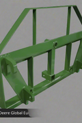 John Deere Euro Global 2-in-1 hay spear and pallet fork combo in use

Front view of the green hay spear attachment

Close-up of pallet fork mount

Forklift-style prongs on John Deere combo attachment

Side view of the detachable hay spear
