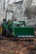 Clamp-on debris fork attachment on black tractor bucket – 60 inch
Green John Deere tractor with clamp-on fork attachment hauling debris
72-inch clamp-on debris forks mounted on front loader