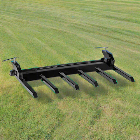 Clamp-on debris fork attachment on black tractor bucket – 60 inch
Green John Deere tractor with clamp-on fork attachment hauling debris
72-inch clamp-on debris forks mounted on front loader