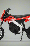Red kids 36V electric dirt bike side view

Model CS3288 electric motocross bike for kids

Rear disc brake and suspension on 300W dirt bike

Young rider electric toy motorcycle CS3288

Knobby off-road tires on kids 36V electric bike