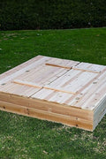 Kids wooden sandbox with cover in backyard setting

Lockable outdoor sandbox filled with sand and toys

Square wooden sandbox with kids playing

Beige sandbox for toddlers in garden area

Assembled kids outdoor sandbox with weather-resistant design