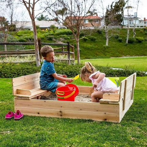 Kids wooden sandbox with cover in backyard setting

Lockable outdoor sandbox filled with sand and toys

Square wooden sandbox with kids playing

Beige sandbox for toddlers in garden area

Assembled kids outdoor sandbox with weather-resistant design