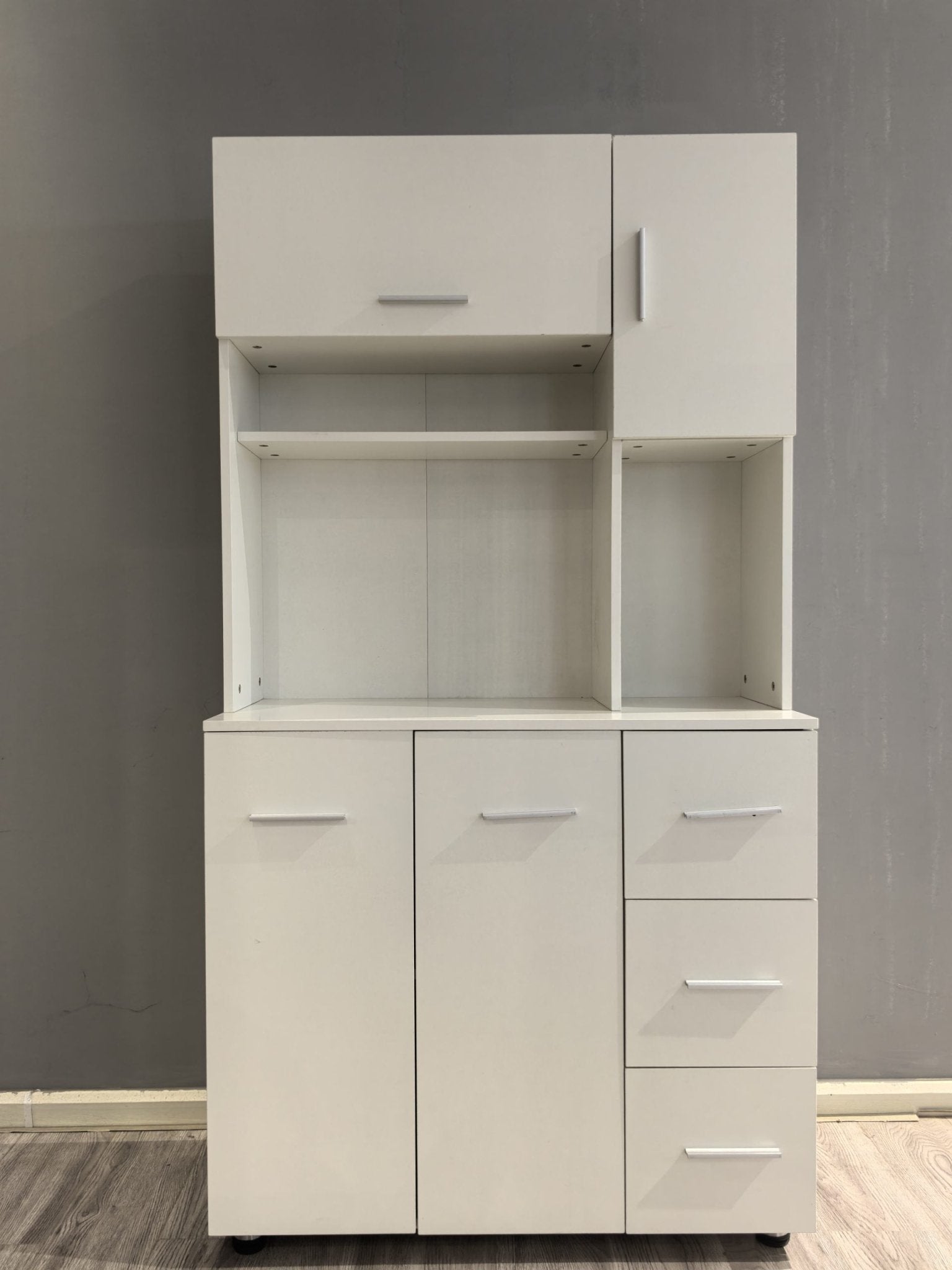"Freestanding white wood kitchen pantry cabinet with adjustable shelves, drawers, and doors – Model 113221"