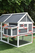 Outdoor rabbit hutch and chicken house with weather-resistant gray paint