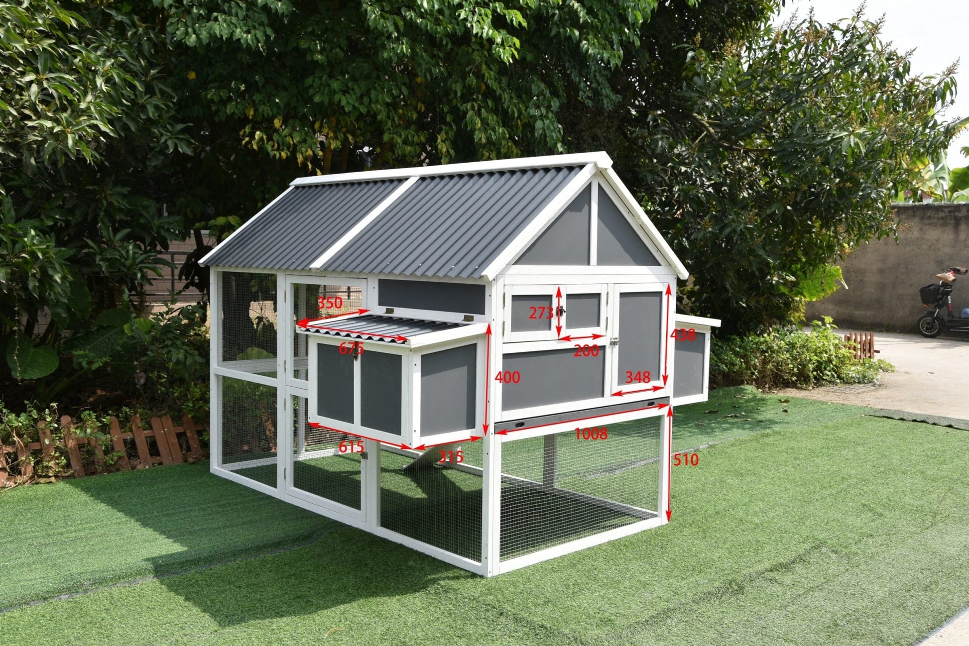 Outdoor rabbit hutch and chicken house with weather-resistant gray paint
