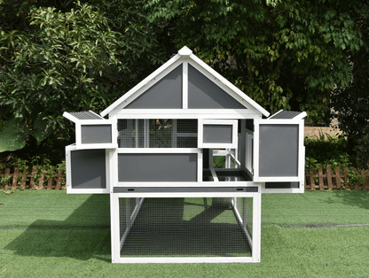 Gray backyard chicken run with multiple access points and predator-proof design