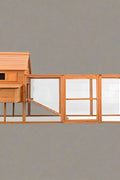 Large wooden backyard chicken coop with galvanized roof, nesting box, and walk-in run
