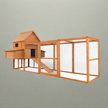 Large wooden backyard chicken coop with galvanized roof, nesting box, and walk-in run
