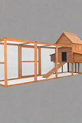 Large wooden backyard chicken coop with galvanized roof, nesting box, and walk-in run
