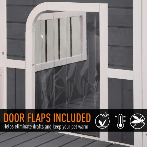 Large wooden raised outdoor dog house with porch – cabin-style weatherproof pet shelter
