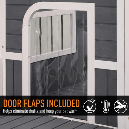 Large wooden raised outdoor dog house with porch – cabin-style weatherproof pet shelter
