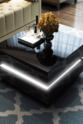 LED coffee table black gloss with ambient light in living room

White LED high gloss coffee table with modern decor

Top-down view of illuminated cubic coffee table

High gloss coffee table close-up with LED lighting effect

