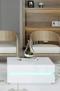 LED coffee table black gloss with ambient light in living room

White LED high gloss coffee table with modern decor

Top-down view of illuminated cubic coffee table

High gloss coffee table close-up with LED lighting effect

