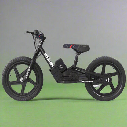 Kids 16" black electric balance bike with training wheels
Side view of 12" black lithium e-bike for children