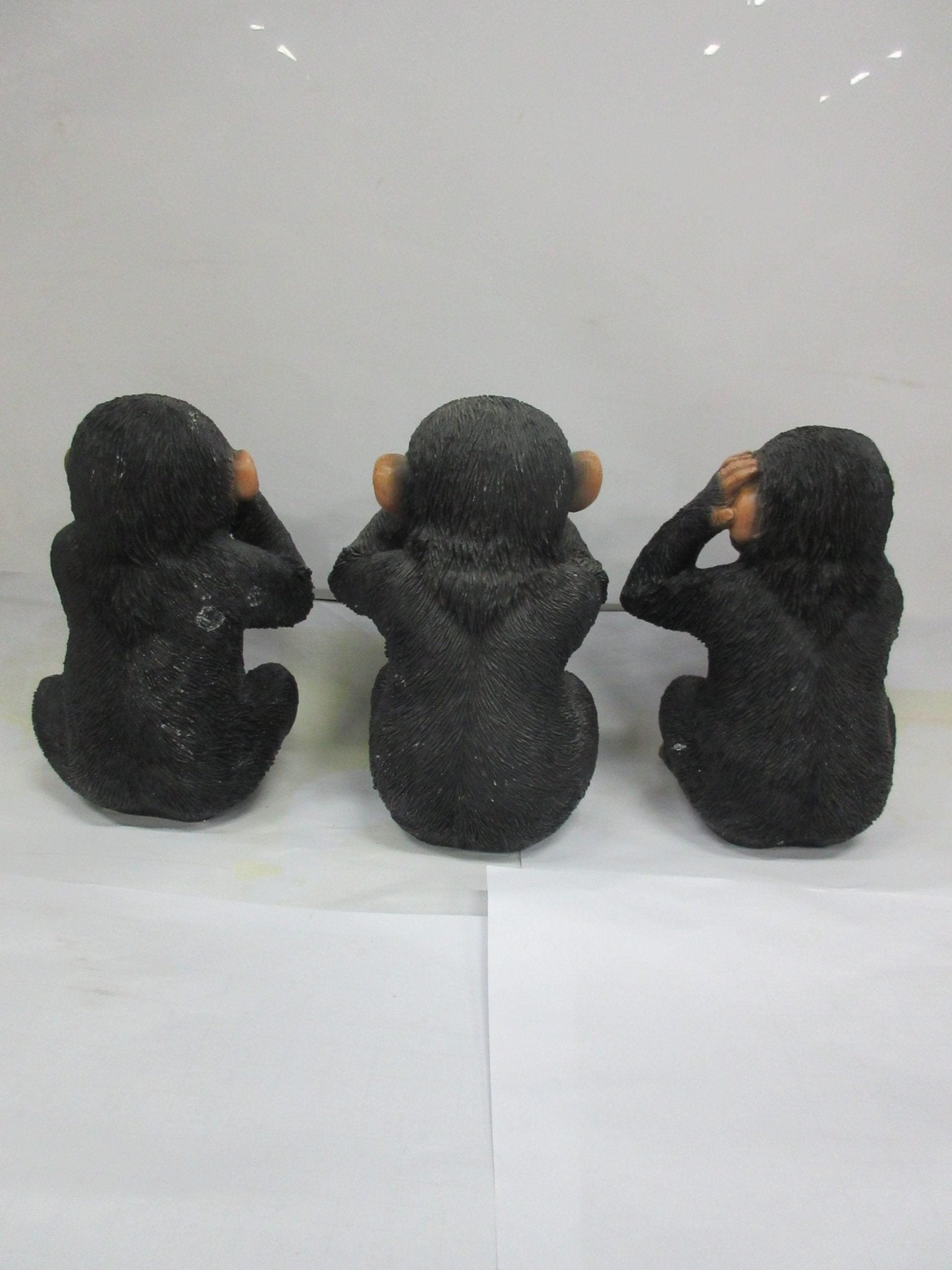 Three wise monkeys garden statues in black resin
See No Evil, Hear No Evil, Speak No Evil figurines set
Black resin symbolic monkey sculptures for garden or home