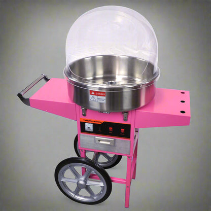 Pink Candy Floss Machine with Dome Cover – Front View

Commercial Cotton Candy Machine – Close-Up of Controls

Candy Floss Cart with Wheels – Party Setup

Dome Cover Cotton Candy Maker – Rear View

Pink Cotton Candy Machine in Use – Carnival Event