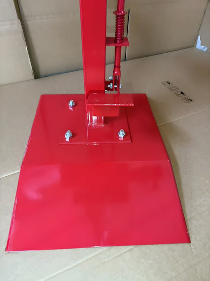 Manual tire changer and spreader stand with red base and swivel platform
Tire changer stand showing adjustable tilt function and tool tray
Manual tire repair stand for light truck tires in auto repair garage