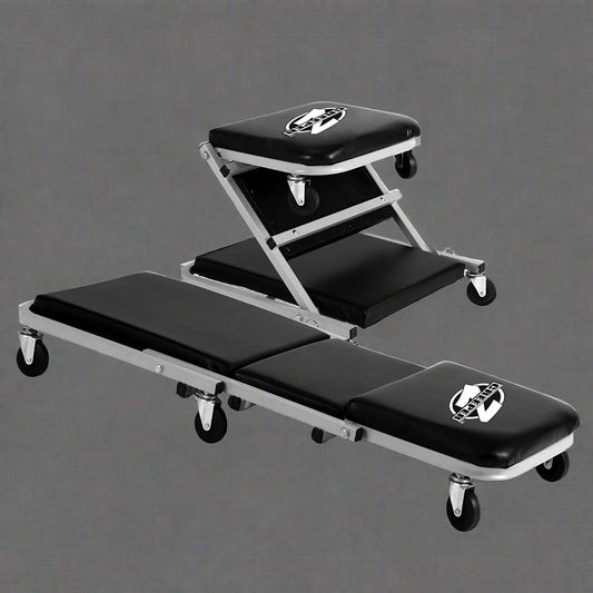 Mechanics creeper rolling cart with padded vinyl surface

Convertible garage seat and creeper with 6 caster wheels

Black auto repair creeper with metal frame and seat

S1066 rolling creeper seat in upright position for repairs