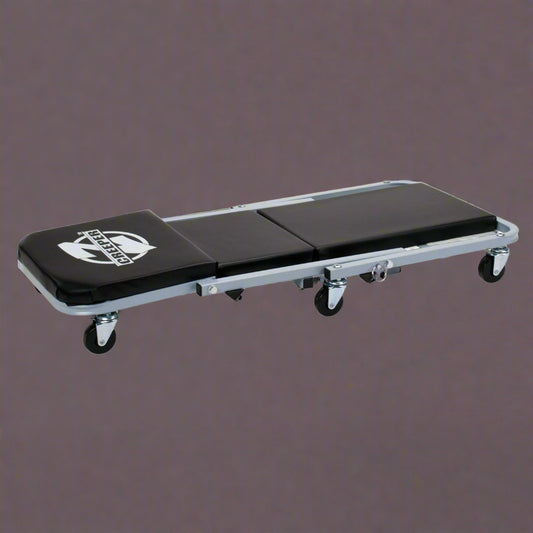 Mechanics creeper rolling cart with padded vinyl surface

Convertible garage seat and creeper with 6 caster wheels

Black auto repair creeper with metal frame and seat

S1066 rolling creeper seat in upright position for repairs