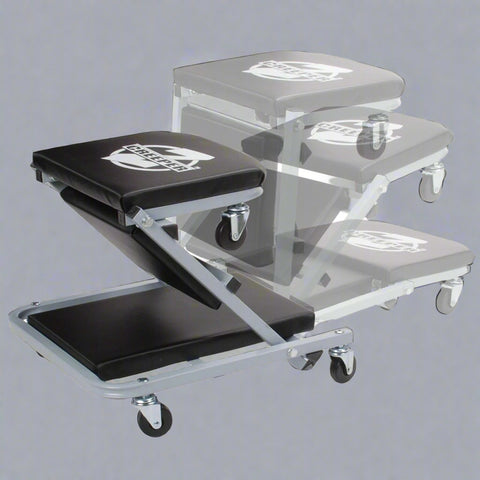 Mechanics creeper rolling cart with padded vinyl surface

Convertible garage seat and creeper with 6 caster wheels

Black auto repair creeper with metal frame and seat

S1066 rolling creeper seat in upright position for repairs