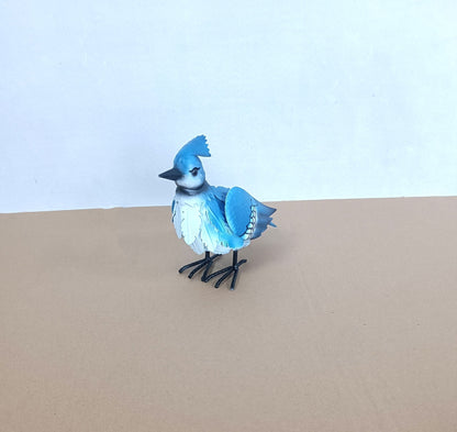 Blue Jay Figurine: Blue Metal Blue Jay Bird Sculpture – Outdoor Garden Art

Both Birds: Set of Metal Bird Yard Art Statues – Red Cardinal & Blue Jay

Close-ups: Close-Up View of Hand-Painted Outdoor Bird Figurines