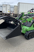 Mini skid steer attachment with hydraulic auger
Green mini skid loader with stump grinder attachment
Heavy-duty mini skid steer snow blower
Landscaping auger tool for mini skid loader
Mini skid attachments for trenching and clearing
