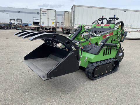 Mini skid steer attachment with hydraulic auger
Green mini skid loader with stump grinder attachment
Heavy-duty mini skid steer snow blower
Landscaping auger tool for mini skid loader
Mini skid attachments for trenching and clearing