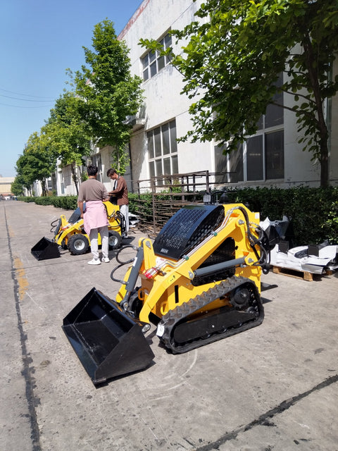 “T380 compact skid steer loader with rubber tracks”

“T460 mini tracked loader for landscaping and excavation”

“Heavy-duty skid steer with universal quick attach plate”

“Tracked compact construction loader in yellow”