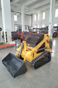 “T380 compact skid steer loader with rubber tracks”

“T460 mini tracked loader for landscaping and excavation”

“Heavy-duty skid steer with universal quick attach plate”

“Tracked compact construction loader in yellow”