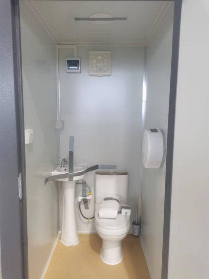 Gray single toilet portable restroom trailer
Double stall mobile toilet unit for construction use
Interior view of portable washroom with sink
Mobile shower unit with privacy enclosure
Pre-installed fixtures inside portable toilet and shower model
