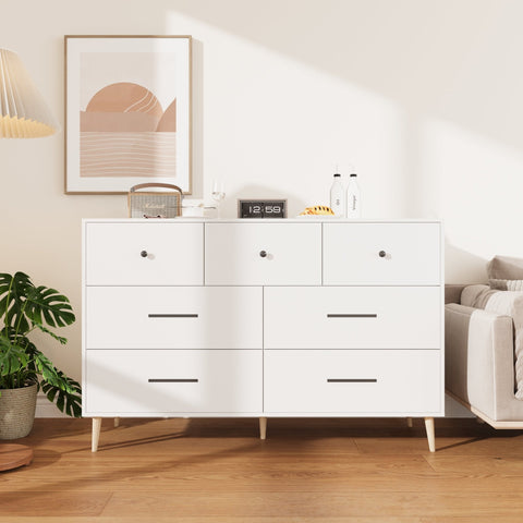 Chestnut 7-Drawer Storage Cabinet in Modern Bedroom Setting

White Modern Dresser with Wooden Legs in Entryway

Close-Up View of Cabinet Drawers and Handles

Chestnut Wood Finish on 7-Drawer Storage Dresser

White 7-Drawer Cabinet with Decorative Plants and Lamp