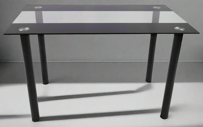 Close-up of black tempered glass tabletop with chrome legs