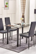 Modern black glass dining table with white leather chairs in dining room setting