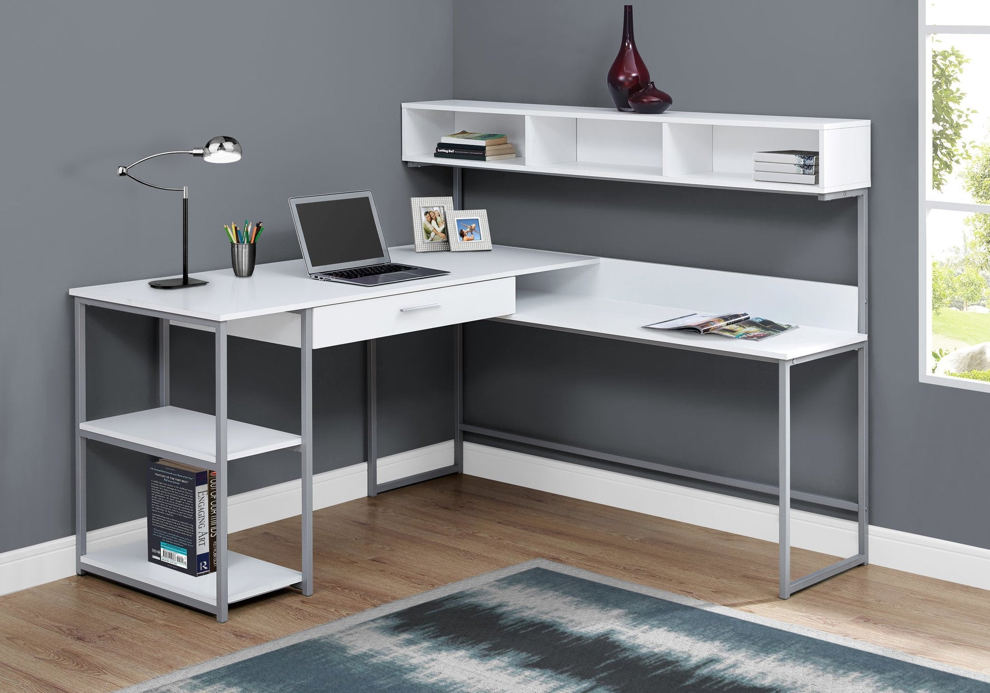 "Modern L-shaped home office desk with wood grain finish"

"Corner workstation desk with metal frame and storage shelves"

"White modern L-shaped computer desk for home office"

"Spacious workstation setup with storage shelving"

"Home office desk with wood grain surface and black frame"