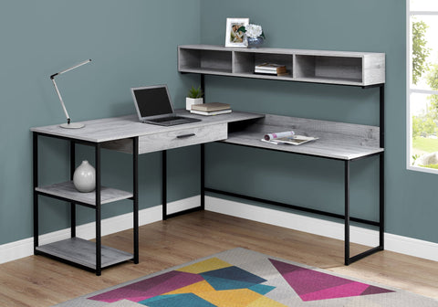 "Modern L-shaped home office desk with wood grain finish"

"Corner workstation desk with metal frame and storage shelves"

"White modern L-shaped computer desk for home office"

"Spacious workstation setup with storage shelving"

"Home office desk with wood grain surface and black frame"