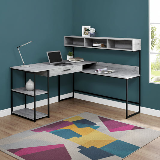 "Modern L-shaped home office desk with wood grain finish"

"Corner workstation desk with metal frame and storage shelves"

"White modern L-shaped computer desk for home office"

"Spacious workstation setup with storage shelving"

"Home office desk with wood grain surface and black frame"