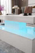 White modern LED coffee table with RGB lights in living room
2-tier high gloss coffee table with remote and colorful lighting
RGB LED coffee table illuminated with 16 color options
Contemporary LED coffee table with under-shelf storage
Stylish white LED light coffee table for modern interiors