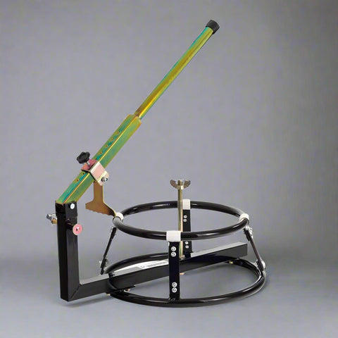 Steel tire changing stand with integrated arm for solo tire removal


